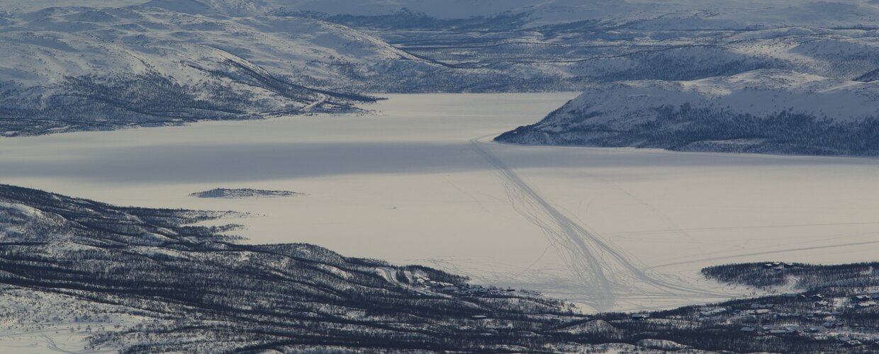An aerial view of frozen Lake Kilpisjarvi in northwestern Finland